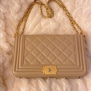 Quilted beige vegan leather handbag